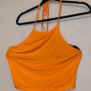 Orange halter style crop top